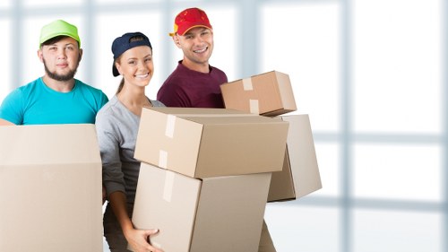 Movers handling items safely in Chelsea Storage