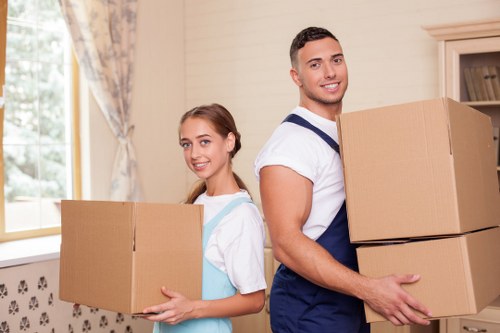 Professional movers handling household items